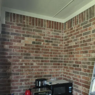 Brick patio wall cabinet installation — gallery image 1