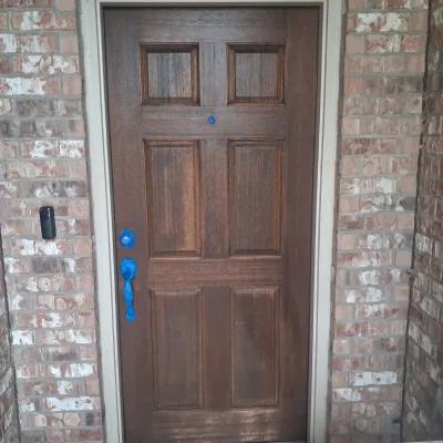 Exterior wood door repair and refinishing — gallery image 1