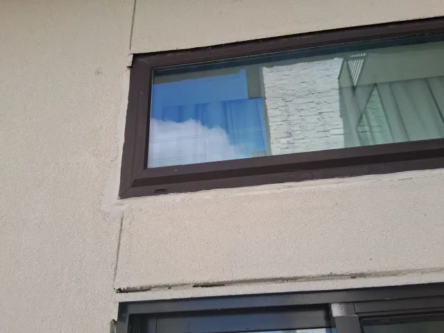 Window stucco sealing and drywall repair