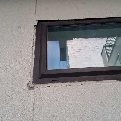 Window stucco sealing and drywall repair — gallery image 1