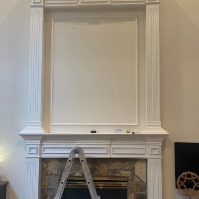 Large Artwork Installation Above Fireplace — gallery image 1