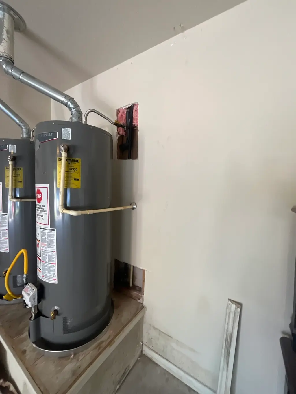 Drywall Repair & Insulation (Water Heater Area)