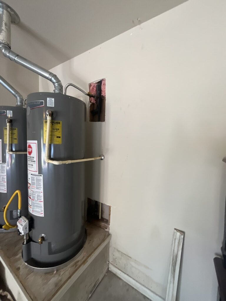 Drywall Repair & Insulation (Water Heater Area)