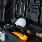 Handyman tools and toolbox on workbench