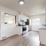 Bright modern kitchen with white cabinets in a Fort Worth home