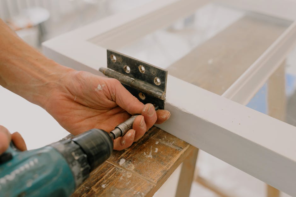 Handyman at work repairing a Houston home window