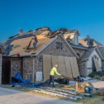 Contractor working on a brick home in Fort Worth, Texas